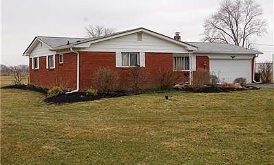 front of home with new landscaping and mulch