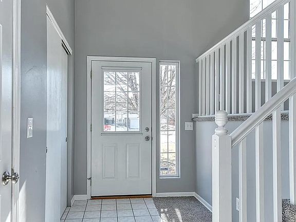 Entry Way. Door to the left is garage