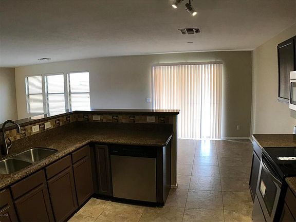 4th image of 15809 W Caribbean Ln