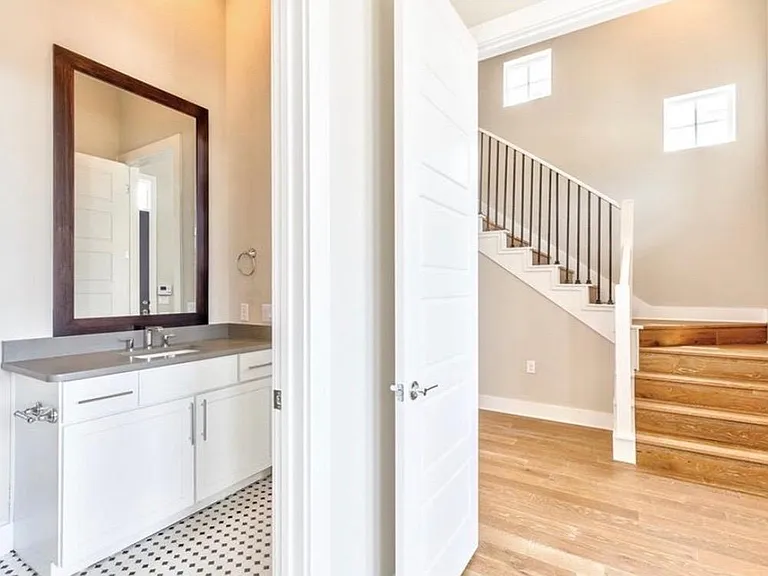 downstairs office or guest room has full bath