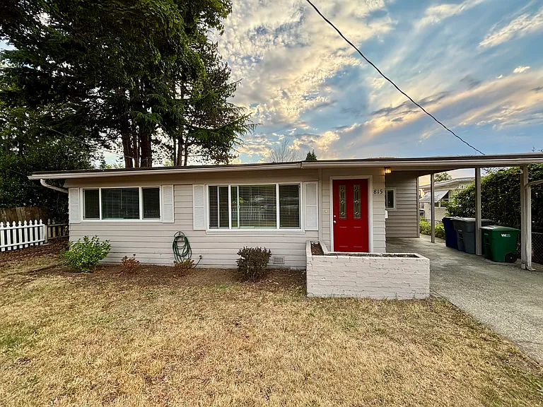 Inviting front exterior with covered entry