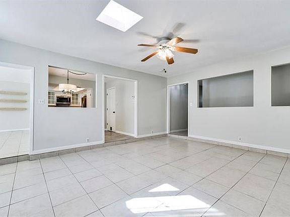 Sunken Living Room with Skylight! Let that Sunshine In.
