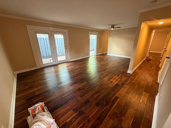 entry into condo that shows the great room and hallway