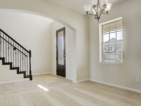 Dining room tucked off foyer