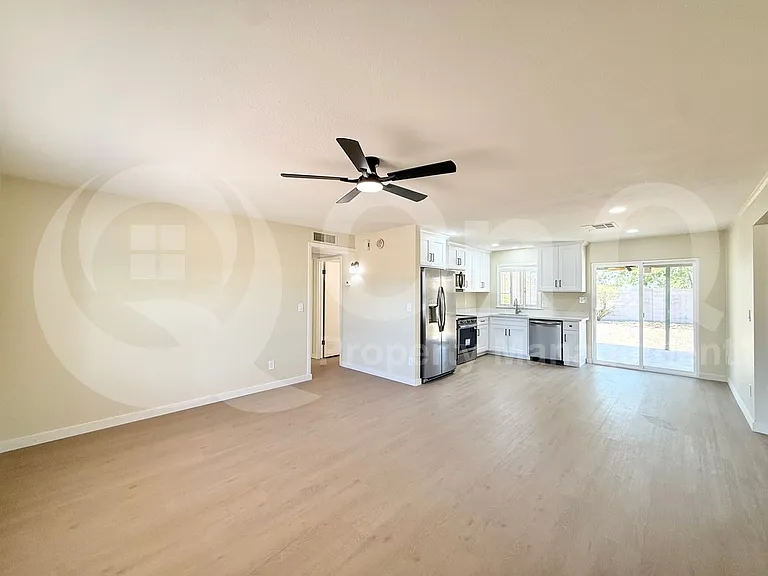 2465 E John Cabot Rd — Photo 4