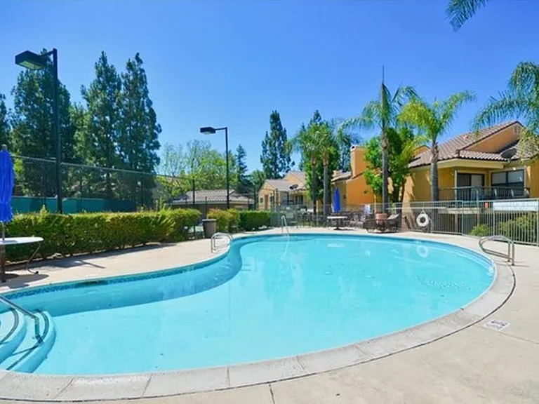 Second swimming pool by tennis court