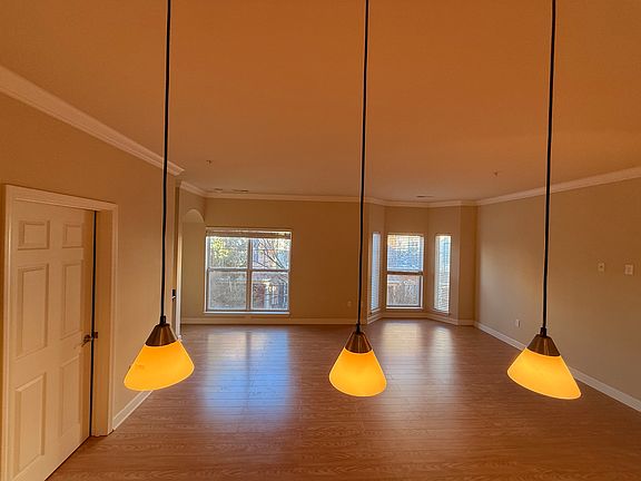 Great room with wood flooring