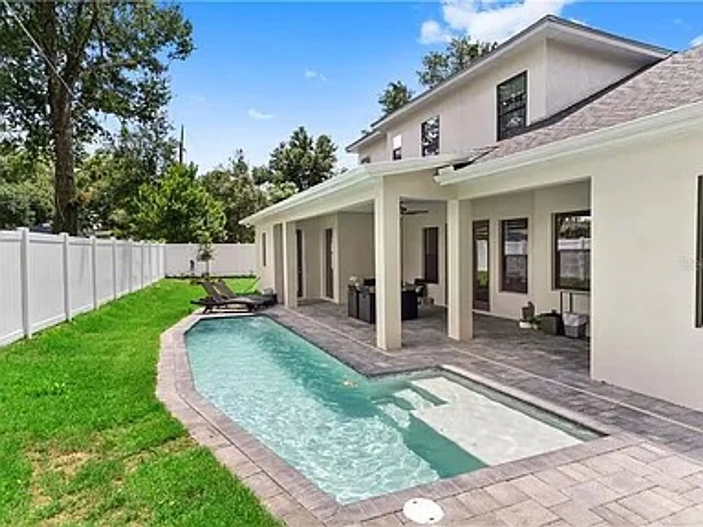 Exquisite 4-Bed, 5.5-Bath Executive Retreat with Lap Pool in Prime Winter Park Location — Photo 2