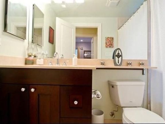 Bathroom has a deep soaking tub, in-ceilling speakers, marbl