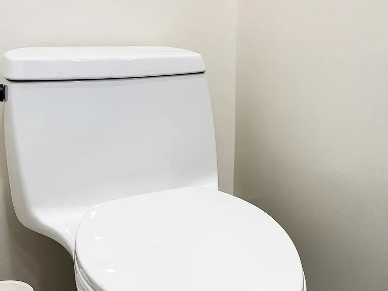 Fully remodeled half bathroom with a new toilet (Pic 3)