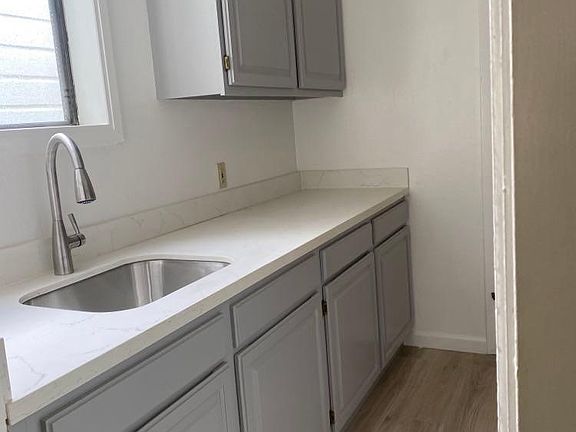 New Fixtures and Refinished Cabinets