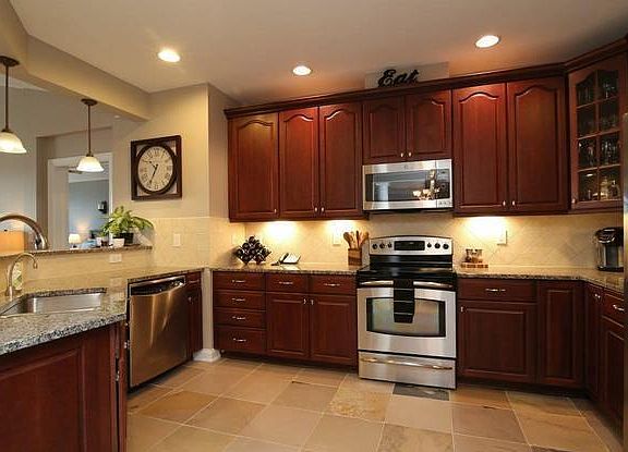Upgraded cabinets, granite countertops, slate flooring
