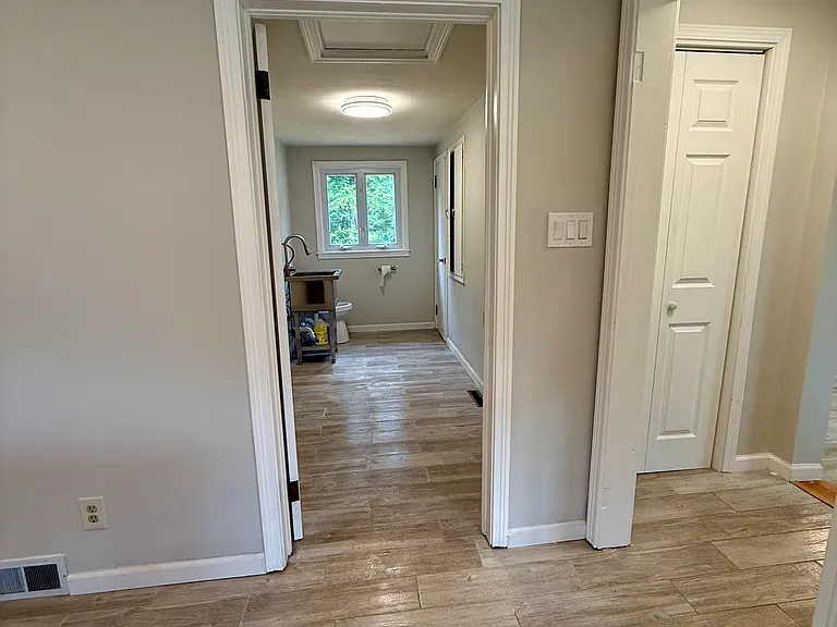 laundry room and half bath off of kitchen