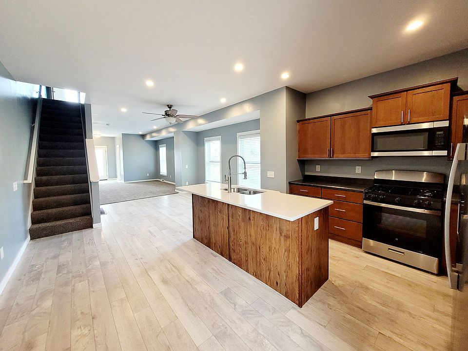 Open concept living, dining and kitchen