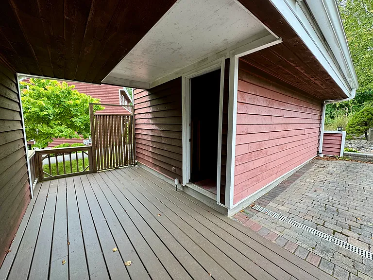 Back entrance to one-car garage