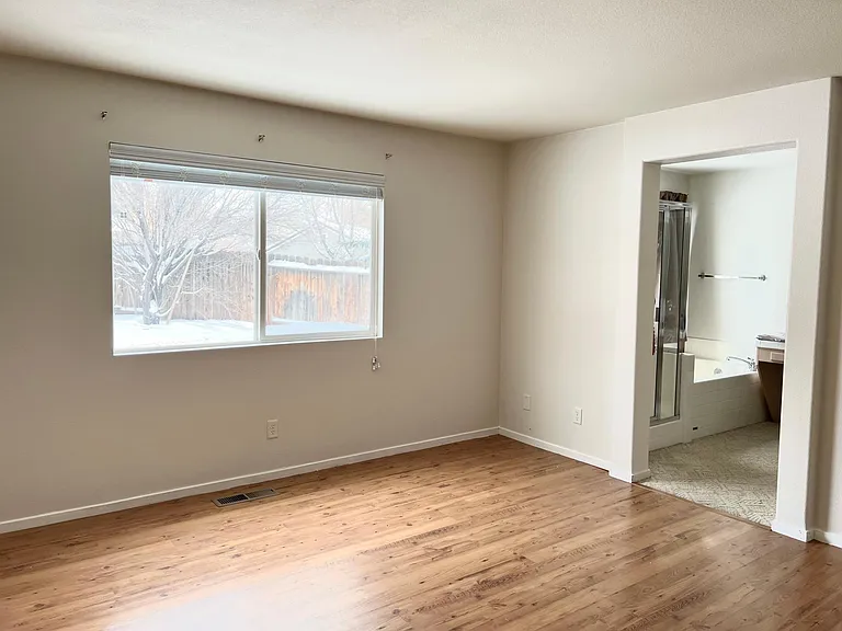 master bedroom w/ full bathroom