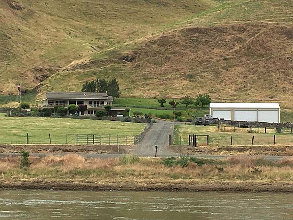 House and shop from river