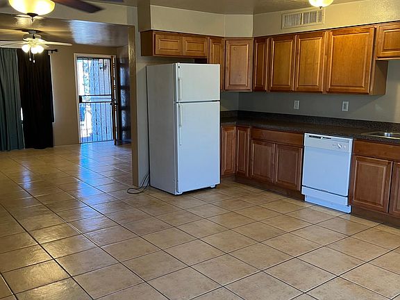 4th image of 6027 S Lostan Ave