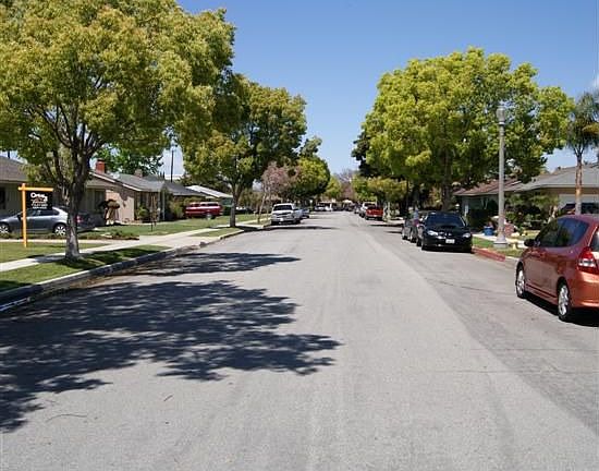 Pride of ownership tree lined street.