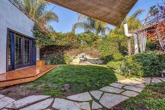 Backyard with master bedroom and deck