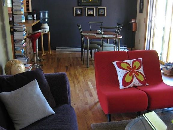 Living looking to dining (lofted ceiling above dining)