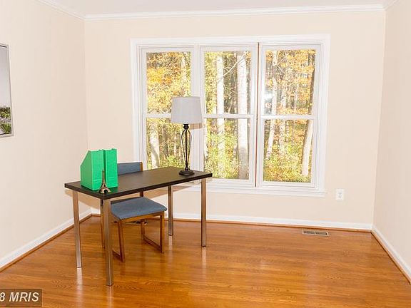 Home office with views of green backyard