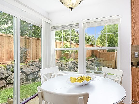 Sunlit Breakfast Nook overlooking the gorgeous backyard