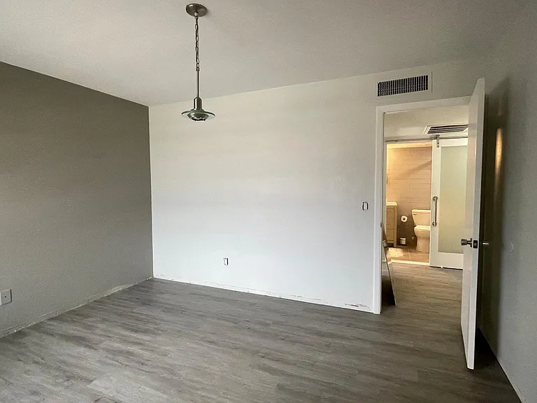 Bedroom 1 with window to the front of unit.