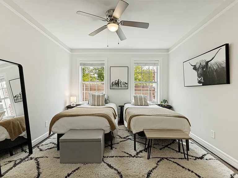 This bedroom has ample space for a queen size bed.