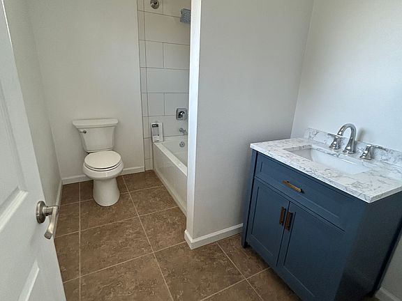 Full Master bathroom with new toilet, bath and shower! Automatic fans with water and moisture detection!