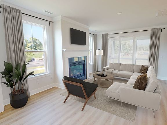 The great room of the Monroe by Brookfield Residential