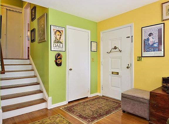 Enter into the colorful and happy home with light and sunshine throughout