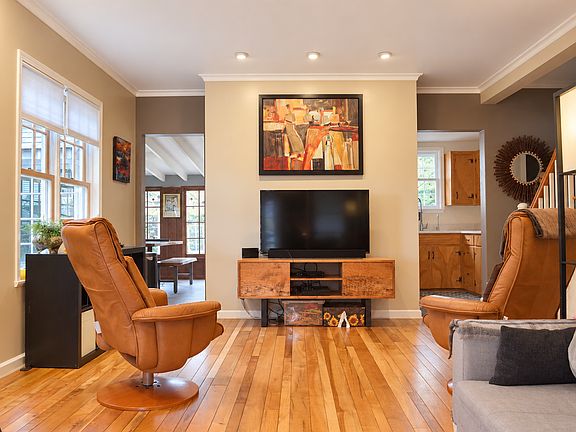 Living room looking into kitchen and dinning room