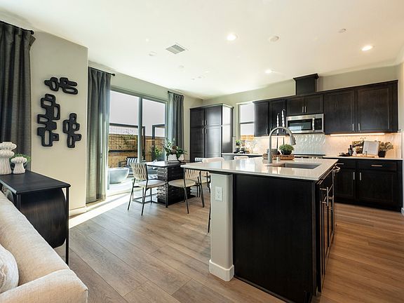 Open and airy Dining Kitchen with oversized Pantry cabinet