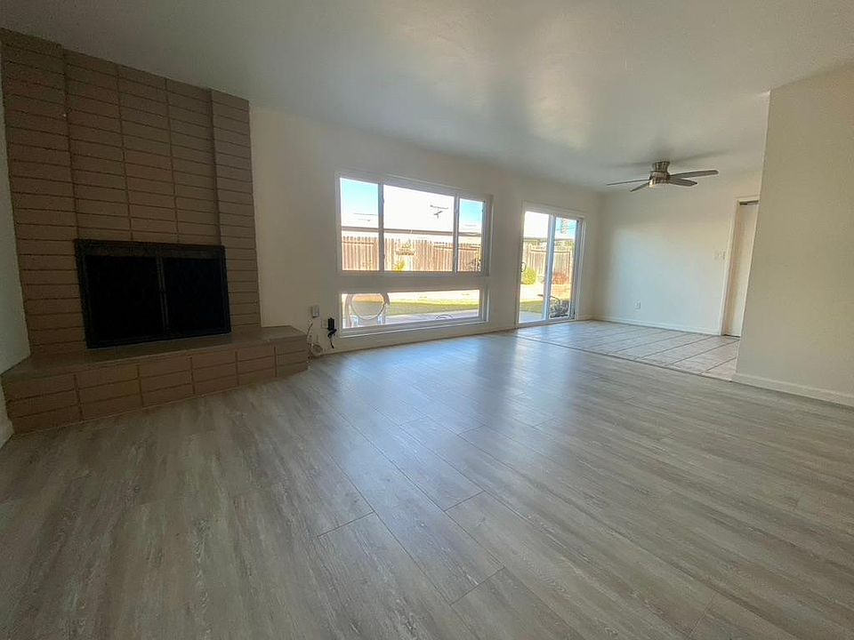 living room / dining area with slider to backyard