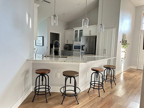 Kitchen from the living and dining room