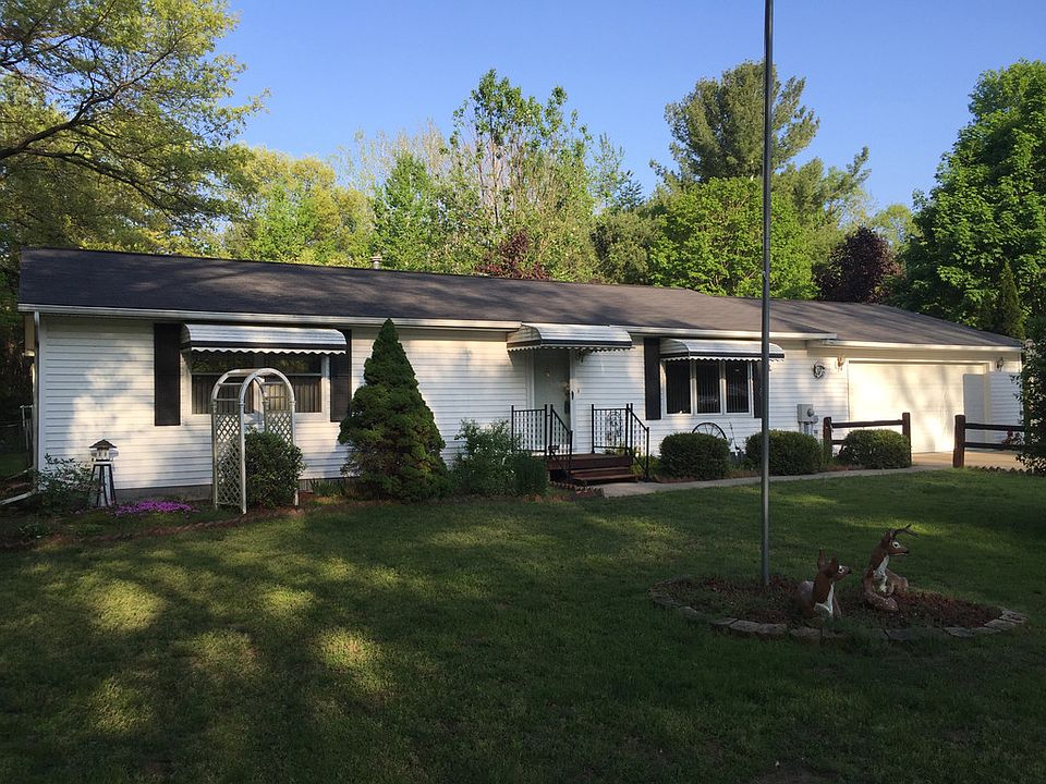 Large fence in back yard, with shed and loads of perennial's, large 2 car attached with door opener. Walking distance to Sanford Lake beach. With a the Sanford Park behind the home.