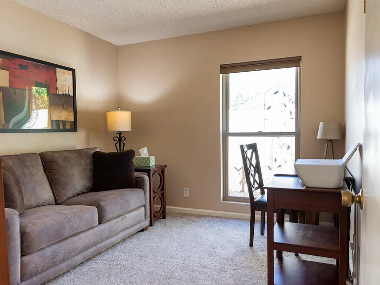 Third bedroom, shown as a study (sofa converts to full bed)