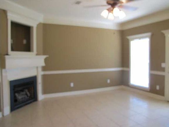 Corner Fireplace in Den