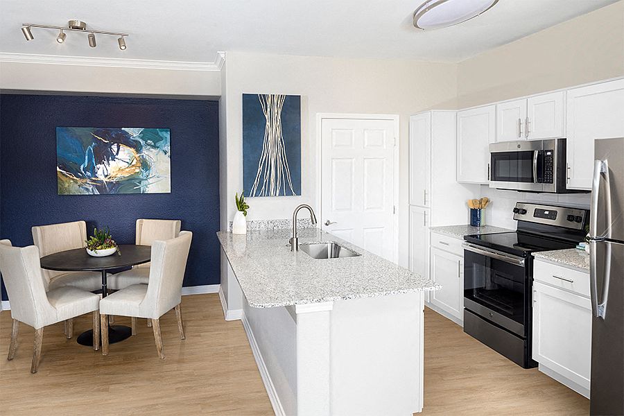 Luxury vinyl plank flooring in all kitchens and baths. In select living and dining rooms.