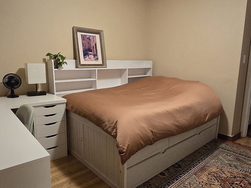 It is completely furnished with a new bed(s) & bedframe with lots of shelf and drawer space. There is a twin bed that slides out from underneath.