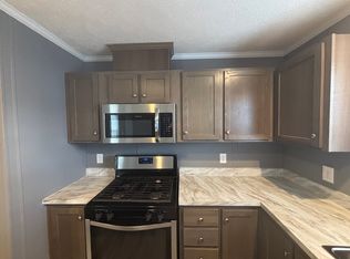 831 N Pontiac Trl #91-72, Walled Lake, MI 48390