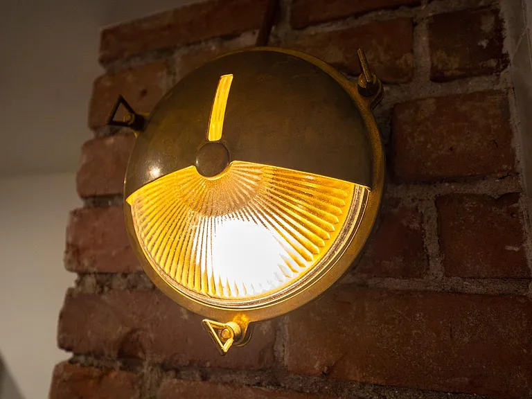 1st floor bathroom brass light fixture