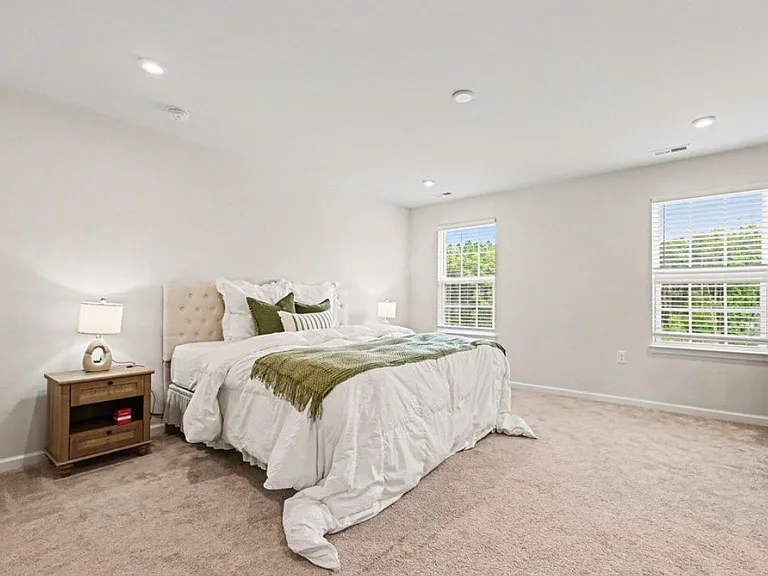 Large Master Bedroom with great lighting