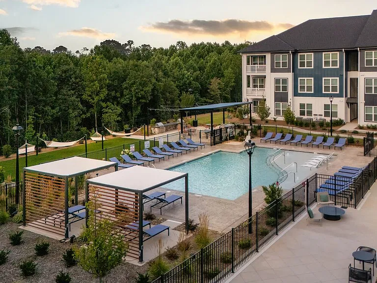 Courtyard with pool, sundeck, and lounge seating