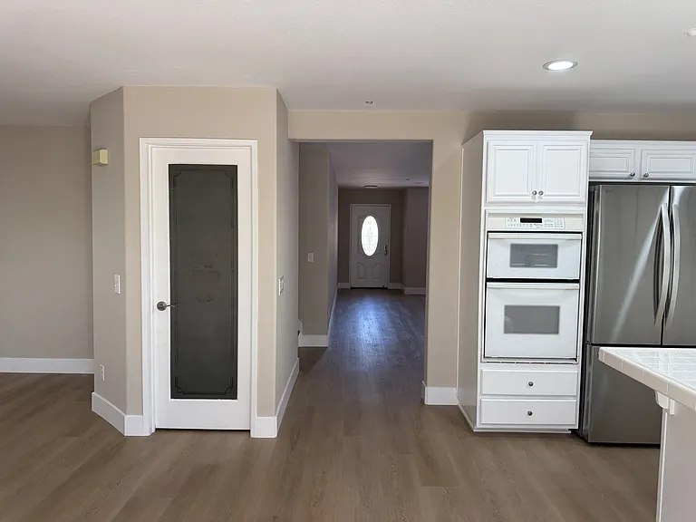 walk in pantry with glass door