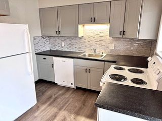 Kitchen with glass back splash