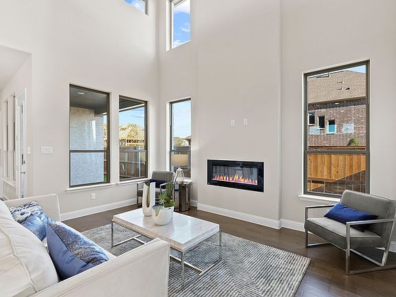 Living room in the Sauvignon home plan by Trophy Signature Homes