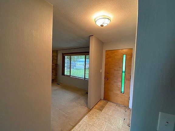 Front Door and Living Room