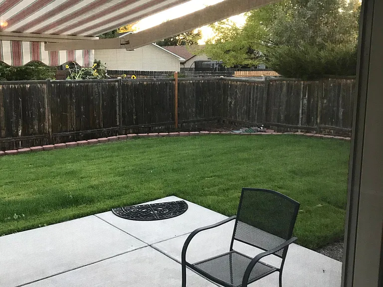 Retractable awning an oasis on over sized patio!